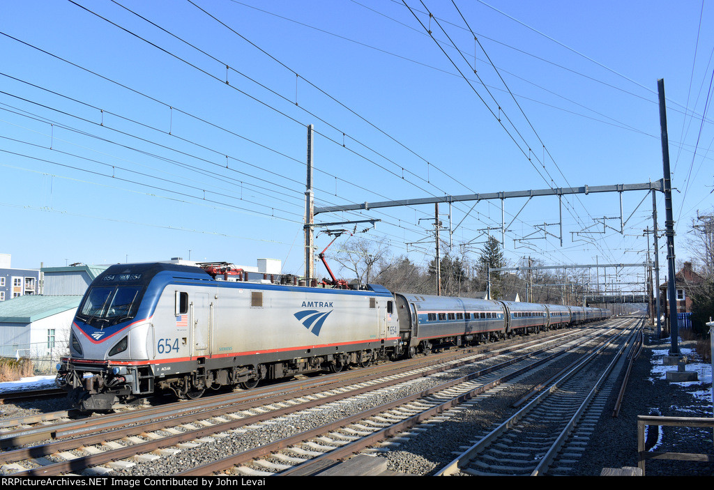 Amtrak NER Train # 155 approaching its stop at Princeton Jct Station with ACS-64 # 654 on the point 